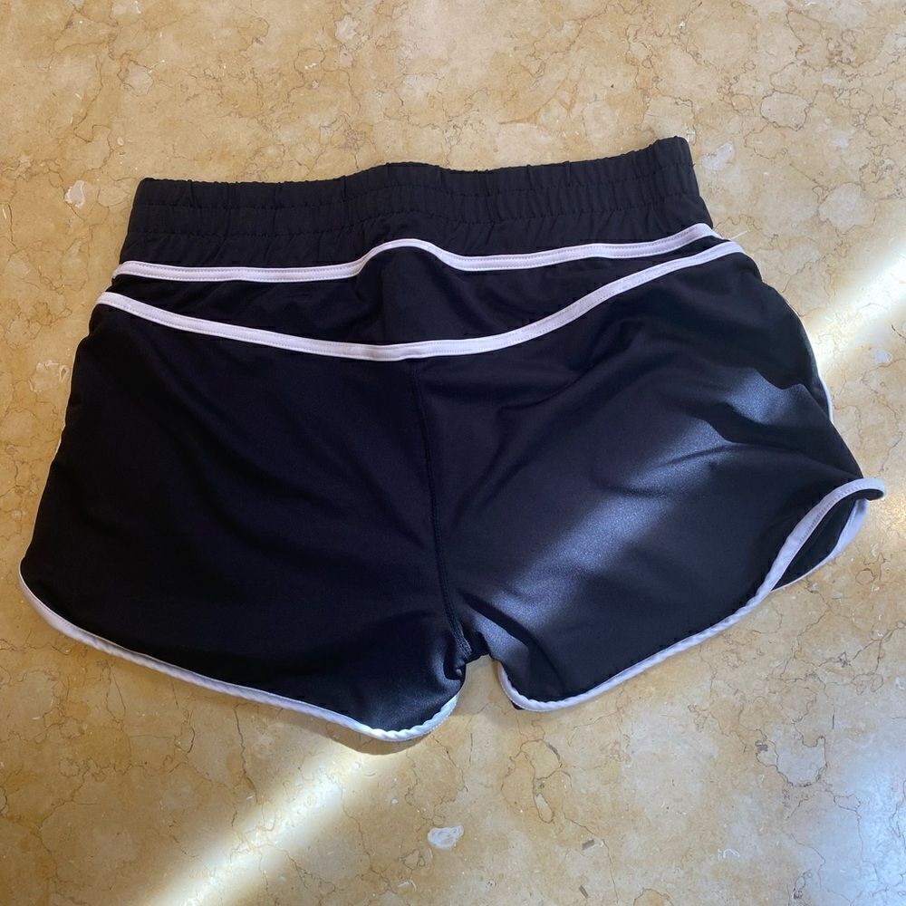 COPY - Saks fifth Avenue “BLUE” athletic shorts in size medium. White trim
